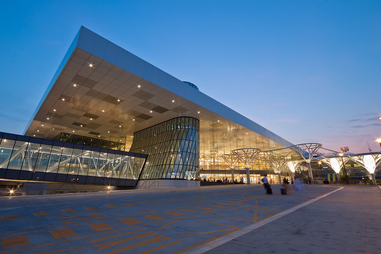 Split airport terminal glowing at night