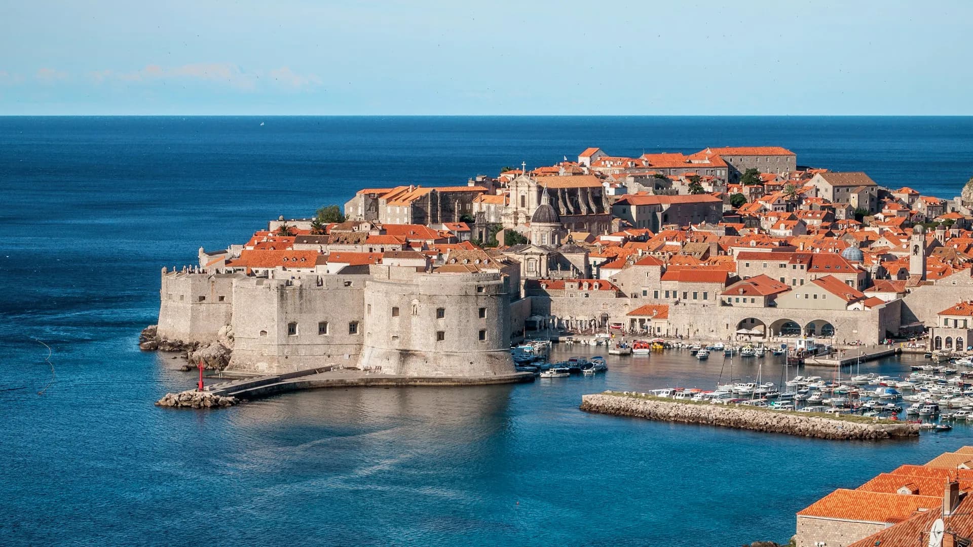 Dubrovnik's walled Old Town and fortress above the blue Adriatic Sea